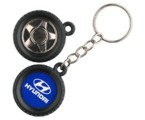 Sleutelhanger met autoband.Drukformaat  25mm.